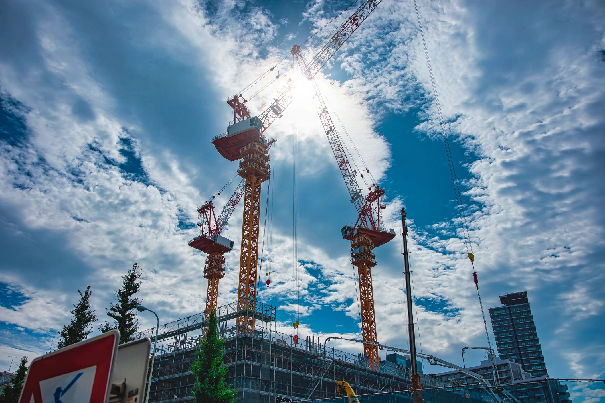 Steel frame construction with cranes at an active jobsite